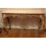 A 19TH CENTURY ITALIAN CONSOLE TABLE In original cream painted finish, the floral border above a