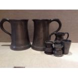 ANDERSON BROS, GLASGOW  A pair of 19th Century pewter tankards, with Victorian touch marks,