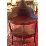 A GEORGIAN MAHOGANY CORNER WASHSTAND With satinwood line inlay and splash back, raised on splayed