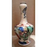 A CHINESE FAMILLE VERTE SLENDER NECKED VASE Kangxi period, base drilled.