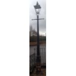 A GOOD VICTORIAN CAST IRON LAMP POST OF GOTHIC DESIGN With a later copper hood and bearing the