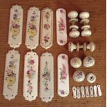 A COLLECTION OF 20TH CENTURY DOOR FURNITURE To include six hand painted ceramic finger plates, a