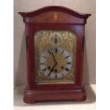 GUSTAV BECKER An Edwardian mahogany mantel clock, with inlaid decoration, brass dial and Roman