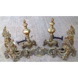 A 19TH CENTURY FRENCH GILT BRONZE CHENET With floral urn finials and cast pierced rails, along