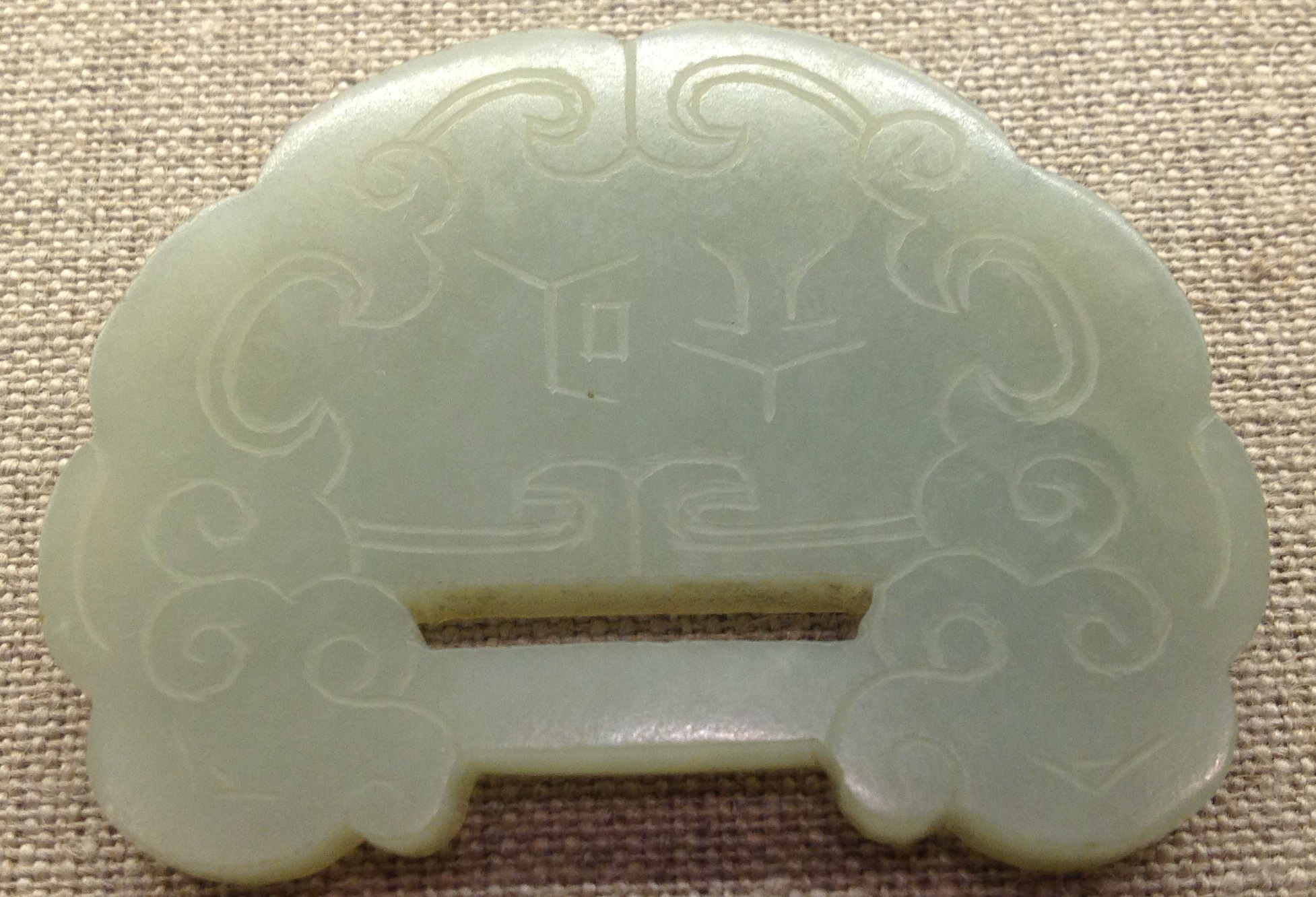 A CHINESE JADE PENDANT.