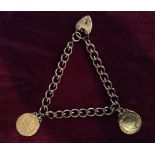 A 9CT ROSE GOLD BRACELET  With gold coin pendant mounts and a padlock clasp. (l 22cm) Condition: