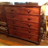 AN EARLY VICTORIAN MAHOGANY CHEST  Fitted with five long drawers, raised on squat bun feet.