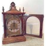 A 19TH CENTURY LENZKIRCH, GERMANY, WALNUT CASED MANTLE CLOCK With shell carved surmount above a