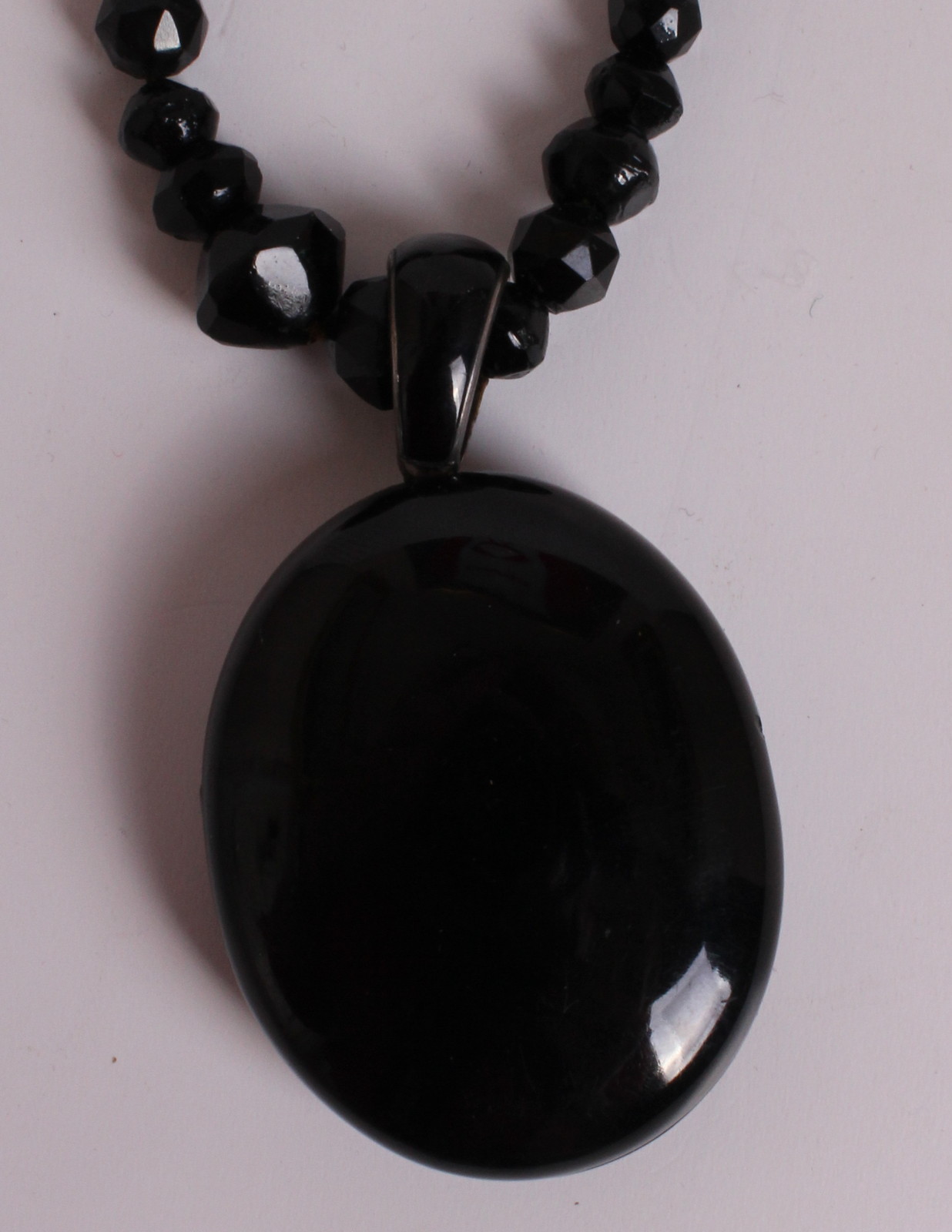 A 1900'S BLACK JET LOCKET With a cut jet bead necklace. - Image 2 of 2