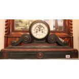 A 19TH/20TH CENTURY FRENCH BLACK AND ROUGE MARBLE MANTLE CLOCK Having bevelled glass, scroll