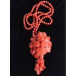 A FINE EARLY VICTORIAN CARVED CORAL BEAD NECKLACE/DROP BROOCH  Yellow metal mounted and complete