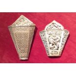 TWO ANTIQUE ASIAN SILVER WALL POCKETS With pierced decoration, the largest having a Trells style