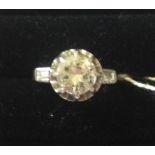 A 20TH CENTURY WHITE GOLD AND ROUND CUT DIAMOND RING  Having a large 1.8ct central diamond,