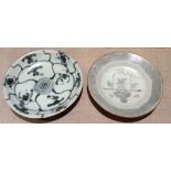 TEKSING SHIPWRECK, TWO EARLY 19TH CENTURY CHINESE PORCELAIN SHALLOW DISHES The first decorated