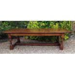 A 17TH/18TH CENTURY DESIGN SOLID OAK REFECTORY TABLE The four plank top supported on turned