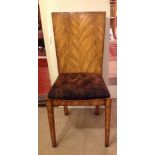 THEODORE ALEXANDER, A SET OF TEN WALNUT DINING CHAIRS With deer skin upholstered seats.