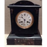 A LATE 19TH CENTURY BELGIAN BLACK SLATE AND MARBLE MANTEL CLOCK The case having an arched top and an