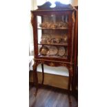 A FINE 19TH CENTURY FRENCH WALNUT DISPLAY CABINET With scrolling pediment above a single door and