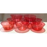 A SET OF EIGHT EARLY 20TH CENTURY CRANBERRY GLASS BOWLS Of conical shape. (approx 12cm x 6cm)