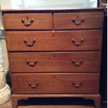 A GEORGIAN DESIGN MAHOGANY BOW FRONTED CHEST Of six long drawers, standing on splayed bracket feet.