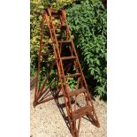 AN EDWARDIAN SET OF POLISHED PINE LIBRARY STEPS  With brass treads. Condition: good, basically sound