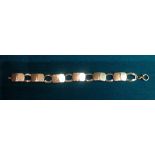 AN EARLY 20TH CENTURY W.M.F. SILVER BRACELET Formed of alternate pierced oval and hammered