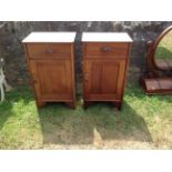 A PAIR OF 19TH CENTURY FRENCH WALNUT AND OAK BEDSIDE CABINETS The single drawers with organic form