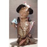 A LATE 19TH CENTURY GERMAN POTTERY BUST Of a dandy gentleman in 18th Century dress, wearing a floppy