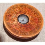 A LATE 19TH/EARLY 20TH CENTURY CHINESE MARINER'S COMPASS Having a turned wooden circular case, the