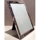 A LARGE EARLY 20TH CENTURY HALLMARKED SILVER MOUNTED OBLONG PHOTOGRAPH FRAME Having an ebonized