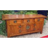 A CHINESE MING DESIGN HARDWOOD SIDEBOARD The three drawers and lower cupboards fitted with heavy