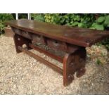 A LATE 19TH CENTURY FRENCH OAK TWO SEATER BENCH Of Gothic design with stile ends and double