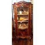 AN EARLY 20TH CENTURY FRENCH WALNUT VERNIS MARTIN DISPLAY CABINET  Having a single door with