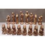 A 20TH CENTURY IVORINE CHESS SET Of Ancient Rome taste, having lion and classical figures pawns,