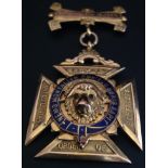 A HALLMARKED 9CT GOLD AND ENAMEL DECORATED ROYAL BUFFALOES MEDAL  Order of Merit, dedicated and