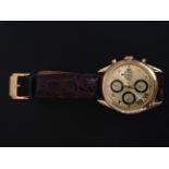 A GENTLEMEN'S FESTINA 18CT YELLOW GOLD DAY DATE WRIST WATCH On leather strap, the gold face with