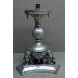 A 19TH CENTURY INDIAN SILVER CENTREPIECE Supported by three elephant heads, each holding a ball