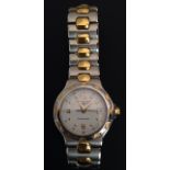 A LADIES' LONGINES 'CONQUEST' BI-COLOUR WRIST WATCH In stainless steel and gold, with seconds hand