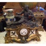 A 19TH CENTURY FRENCH GILT BRONZE AND SPELTER MANTEL CLOCK Figured with a Medieval knight, above a