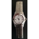 A LADIES' EBEL CLASSIC WAVE STAINLESS STEEL WRIST WATCH On branded stainless steel bracelet, boxed