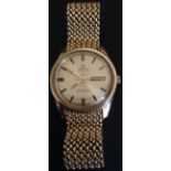 A LATE 1960S GENTLEMEN'S 9CT GOLD OMEGA SEAMASTER AUTOMATIC WRIST WATCH The 9ct original strap