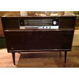 GRUNDIG, A 1960S GERMAN LACQUERED TEAK FINISH MULTI STEREO CONSOLE LUMOPHON AUTOMATIC 36 Having a