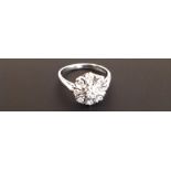 AN 18CT GOLD, DIAMOND SET FLORAL CLUSTER RING Marked '750' (size J). (5394/BG1173671/2)