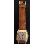 A LADIES' CARTIER 'PANTHERE' 18CT GOLD WATCH On tan leather strap with sapphire crown winder, date