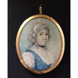 AN 18TH CENTURY IVORY PORTRAIT MINIATURE  Of a lady wearing a blue dress, with a pink hair ribbon