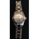 A LADIES' TAG HEUER AQUARACER STAINLESS STEEL WRIST WATCH With calendar window and seconds hand,