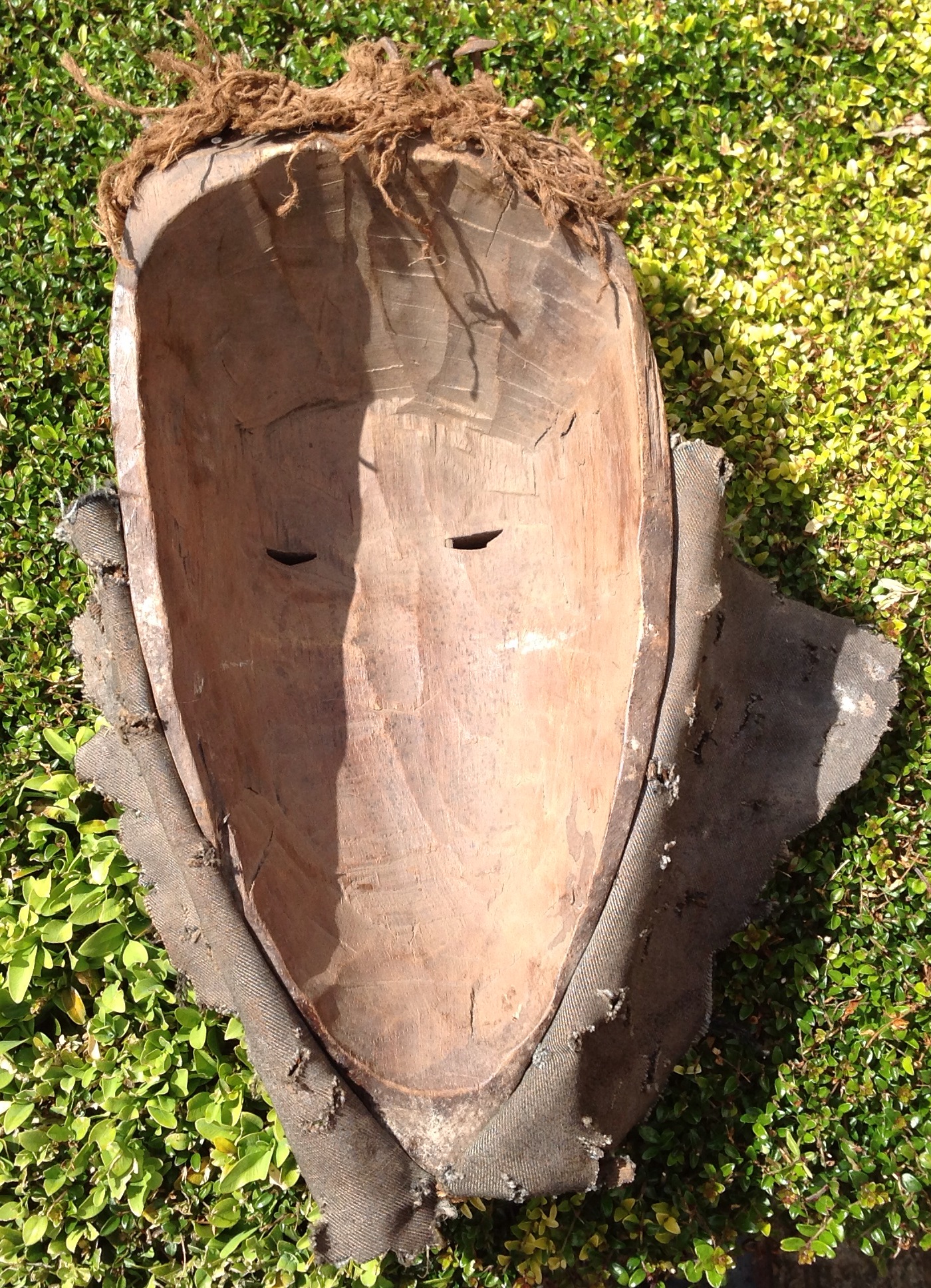 A CARVED AFRICAN TRIBAL ART SONGYE WOODEN MASK Having carved eyebrows and a protruding square mouth, - Image 2 of 2