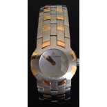 A LADIES' MAURICE LACROIX STAINLESS STEEL AND 18K GOLD WRIST WATCH The manual movement with gold