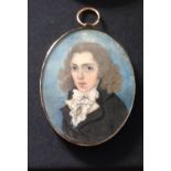 FREDERICK BUCK, AN 18TH CENTURY PORTRAIT MINIATURE  A young gentleman with long hair, wearing a