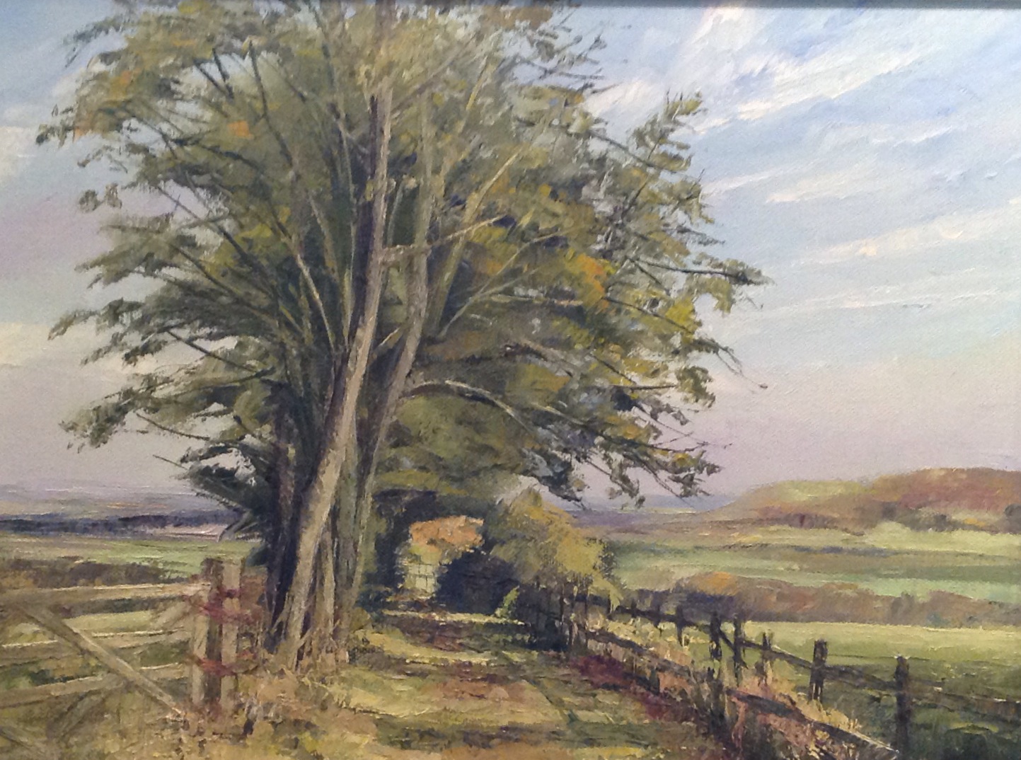 BRIAN BENNETT, BRITISH, A 20TH CENTURY LANDSCAPE  With a tree lined country path, gilt framed.  (